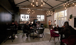 Qube West creative space with members at work