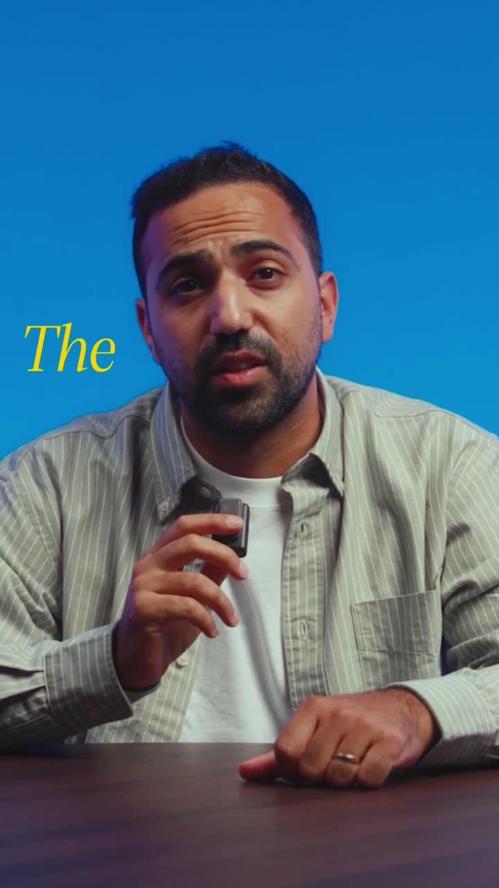 Amin Hamzianpour speaking into a microphone